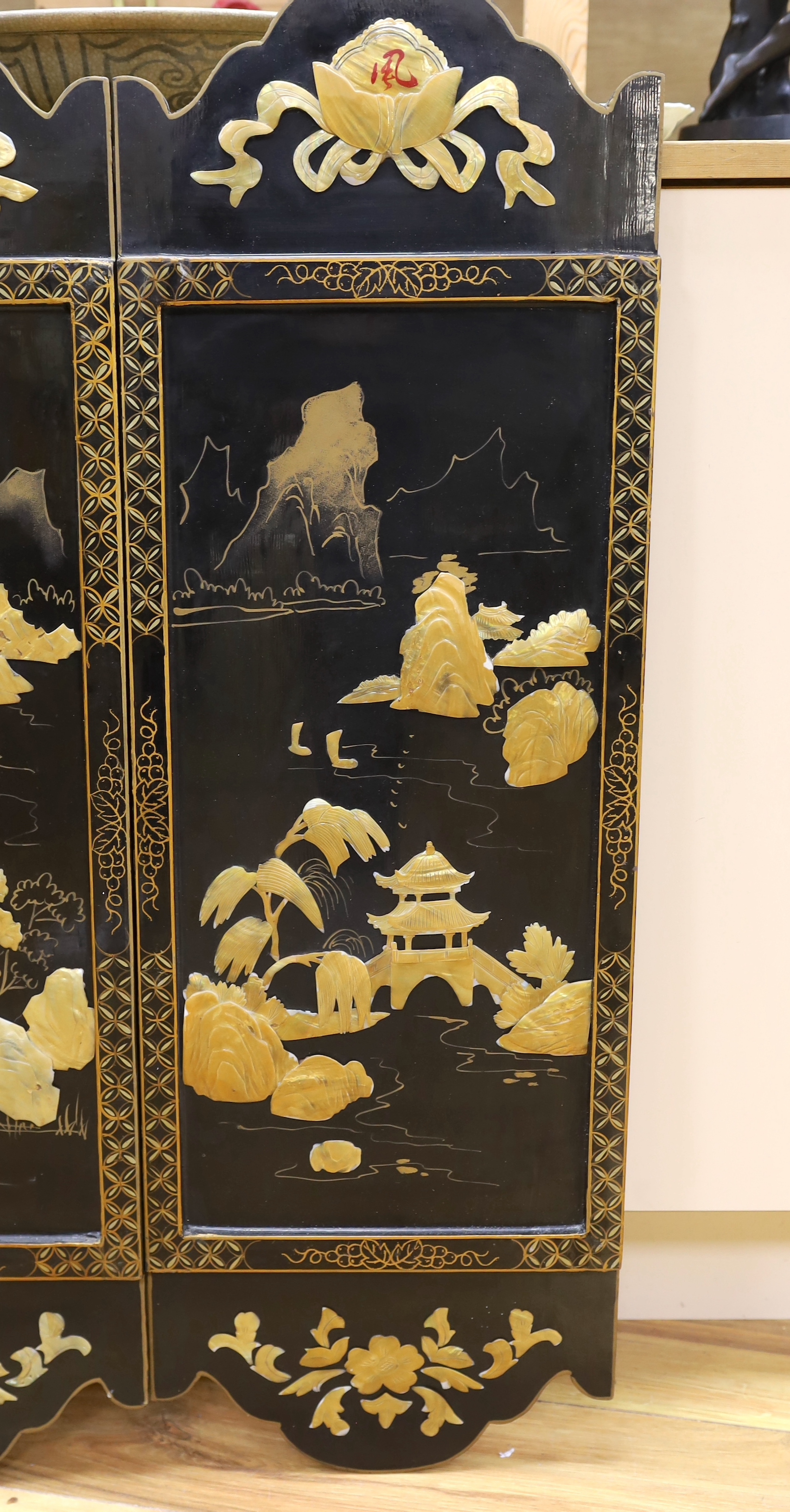 Three Chinese black lacquered, mother of pearl inset and gilt decorated panels, 94cm high